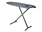 Ironing board with holder for iron